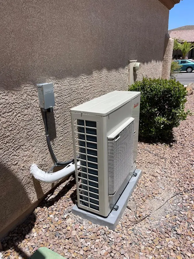 Residential air conditioning condenser unit in Van Buren